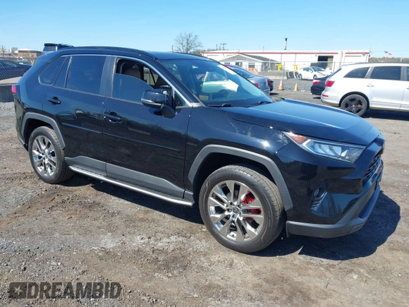 2021 Toyota RAV4 XLE Premium with VIN 2T3A1RFV6MC236809, listed as a IAAI auction lot 42056379 with 99,921 mi miles and . Bid and sale history available at DreamBid. Image 1.