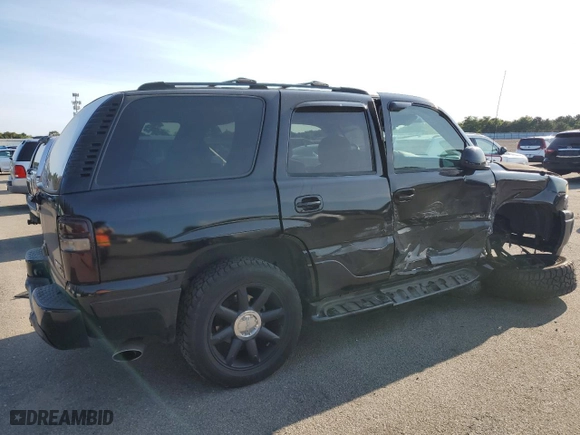 2004 GMC Yukon Denali with VIN 1GKEK63U74J212674, listed as a Copart auction lot 69704734 with 174,893 mi miles and Salvage Title. Bid and sale history available at carsss.com. Image 3.