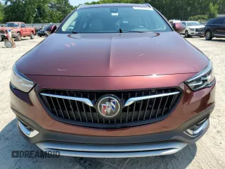2018 Buick Regal Essence с VIN W04GV8SX5J1176203, выставлен на аукционе Copart как лот 66086824 с пробегом 57 879 миль миль и Списание • Salvage title. История ставок и продаж доступна на DreamBid. Изображение 5.
