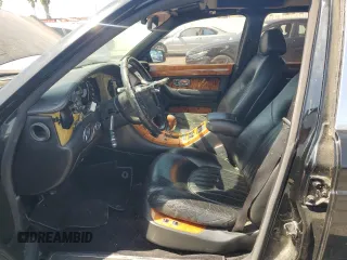 2001 Bentley Arnage z VIN SCBLC31E81CX05759, wystawiony jako Copart lot #56231445 z przebiegiem Nie podano mil oraz Tytuł czysty. Historia ofert i sprzedaży dostępna na DreamBid. Obrazek 7.