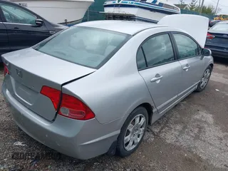 2006 Honda Civic LX z VIN 1HGFA16596L032275, wystawiony jako IAAI lot #42184178 z przebiegiem 220 657 mil mil oraz . Historia ofert i sprzedaży dostępna na DreamBid. Obrazek 4.