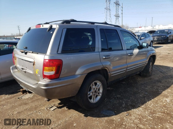 1999 Jeep Grand Cherokee Limited with VIN 1J4GW68N8XC770353, listed as a Copart auction lot 74670614 with Not provided miles and Non repairable. Bid and sale history available at DreamBid. Image 3.