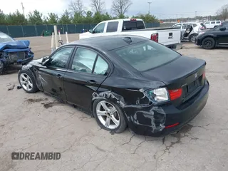 2014 BMW 3 Series 320i xDrive with VIN WBA3C3C51EF983320, listed as a IAAI auction lot 42091122 with 12,312 mi miles and . Bid and sale history available at DreamBid. Image 3.