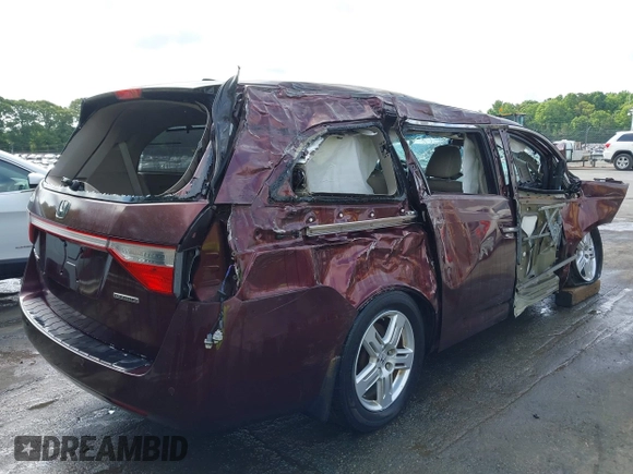 2012 Honda Odyssey Touring z VIN 5FNRL5H98CB035454, wystawiony jako IAAI lot #42285987 z przebiegiem Nie podano mil oraz . Historia ofert i sprzedaży dostępna na DreamBid. Obrazek 13.