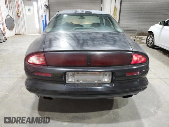 1999 Oldsmobile Aurora with VIN 1G3GR62C8X4117519, listed as a Copart auction lot 77984084 with 188,949 mi miles and Clean Title. Bid and sale history available at DreamBid. Image 6.