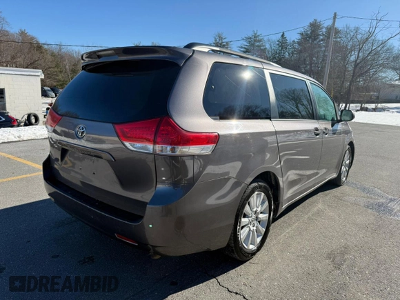 2014 Toyota Sienna LE with VIN 5TDJK3DC4ES074014, listed as a Copart auction lot 48602075 with 284,647 mi miles and Clean Title. Bid and sale history available at DreamBid. Image 4.