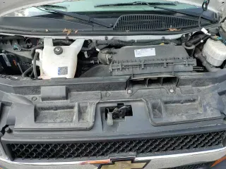 2018 Chevrolet Express Passenger LT z VIN 1GAZGPFPXJ1234733, wystawiony jako Copart lot #59728105 z przebiegiem 92 513 mil mil oraz Szkoda całkowita • Salvage title. Historia ofert i sprzedaży dostępna na DreamBid. Obrazek 16.