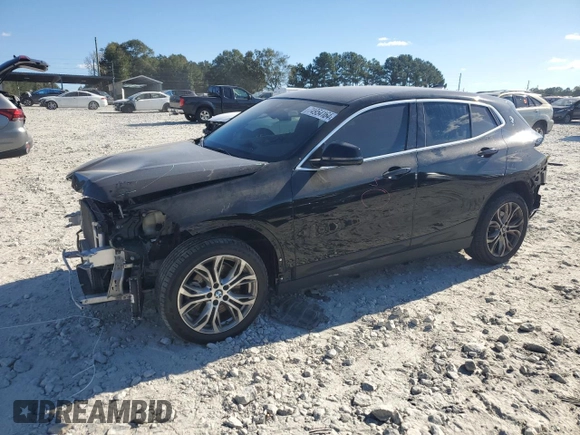 2021 BMW X2 sDrive28i with VIN WBXYH9C08M5S47984, listed as a Copart auction lot 74954164 with 70,829 mi miles and Salvage Title. Bid and sale history available at carsss.com. Image 1.