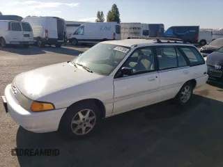 1995 Ford Escort z VIN 3FASP15J0SR164269, wystawiony jako Copart lot #75297324 z przebiegiem 95 548 mil mil oraz Tytuł czysty. Historia ofert i sprzedaży dostępna na DreamBid. Obrazek 1.