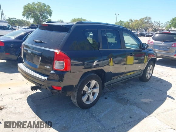 2011 Jeep Compass with VIN 1J4NT1FB6BD195524, listed as a IAAI auction lot 41844275 with 158,534 mi miles. Bid and sale history available at carsss.com. Image 4.