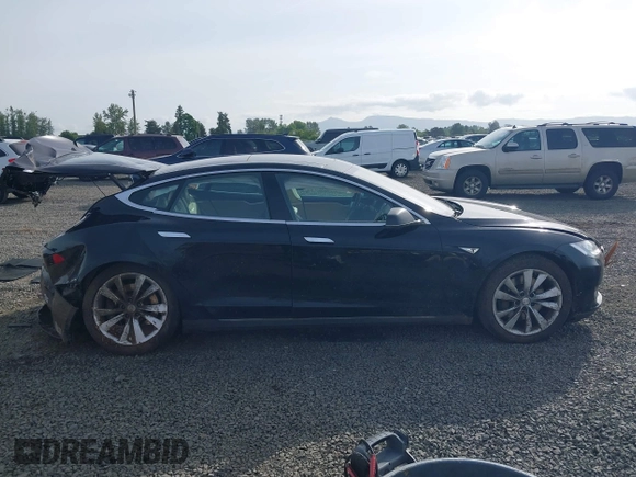 2014 Tesla Model S 60 with VIN 5YJSA1H12EFP53787, listed as a IAAI auction lot 42279493 with 168,859 mi miles and . Bid and sale history available at DreamBid. Image 13.