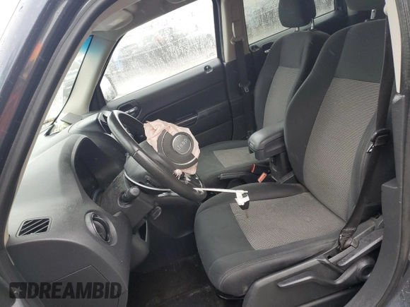2014 Jeep Patriot Latitude with VIN 1C4NJPFA1ED651021, listed as a Copart auction lot 56947445 with 137,239 mi miles and Salvage title. Bid and sale history available at DreamBid. Image 7.