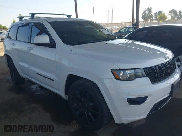 2018 Jeep Grand Cherokee Laredo E with VIN 1C4RJFAG5JC303228, listed as a IAAI auction lot 42375212 with 98,155 mi miles and . Bid and sale history available at DreamBid. Image 1.