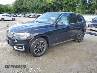 2017 BMW X5 xDrive50i with VIN 5UXKR6C54H0J83891, listed as a Copart auction lot 68123774 with 128,485 mi miles and Salvage title. Bid and sale history available at DreamBid. Image 1.