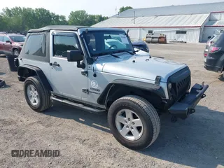 2012 Jeep Wrangler Sport with VIN 1C4AJWAG9CL255278, listed as a IAAI auction lot 42469091 with 140,480 mi miles and . Bid and sale history available at DreamBid. Image 1.