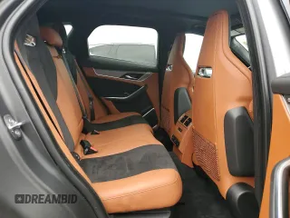 2022 Jaguar F-Pace SVR z VIN SADCZ2EE4NA702878, wystawiony jako Copart lot #74293144 z przebiegiem Nie podano mil oraz Szkoda całkowita • Salvage title. Historia ofert i sprzedaży dostępna na DreamBid. Obrazek 11.