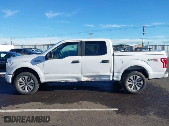 2017 Ford F-150 XL with VIN 1FTEW1EP9HFA26847, listed as a IAAI auction lot 41294852 with 152,543 mi miles. Bid and sale history available at carsss.com. Image 14.