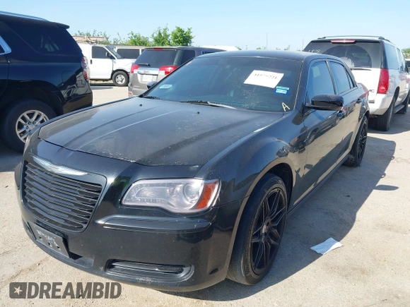 2013 Chrysler 300 with VIN 2C3CCAAGXDH660851, listed as a IAAI auction lot 41970721 with 112,017 mi miles and . Bid and sale history available at carsss.com. Image 2.