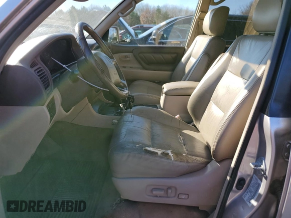 2000 Toyota Land Cruiser with VIN JT3HT05J9Y0121251, listed as a Copart auction lot 82313164 with 265,389 mi miles and Clean Title. Bid and sale history available at carsss.com. Image 7.