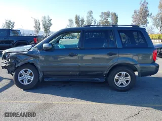 2003 Honda Pilot EX with VIN 2HKYF18633H599550, listed as a IAAI auction lot 41813549 with 242,103 mi miles. Bid and sale history available at carsss.com. Image 15.