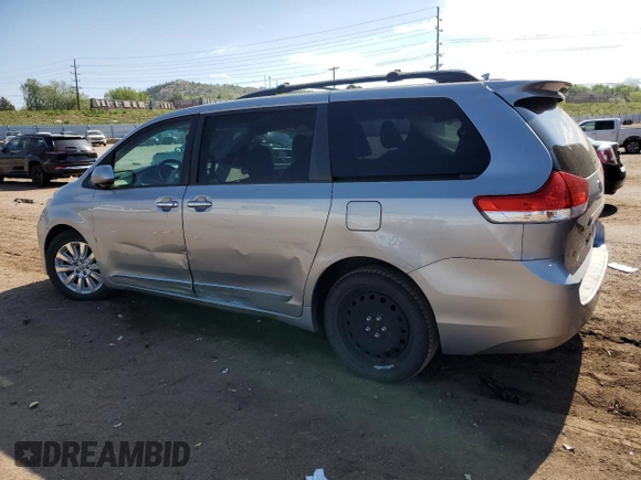 2012 Toyota Sienna XLE with VIN 5TDDK3DC5CS044711, listed as a Copart auction lot 58189195 with 112,172 mi miles and Salvage title. Bid and sale history available at DreamBid. Image 2.