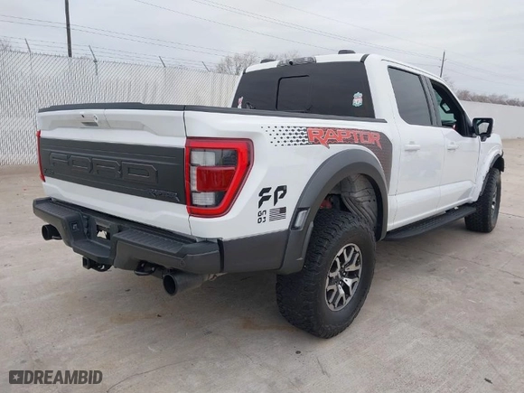 2022 Ford F-150 Raptor with VIN 1FTFW1RG1NFA99947, listed as a IAAI auction lot 41305356 with 33,828 mi miles. Bid and sale history available at carsss.com. Image 4.
