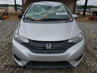 2015 Honda Fit LX z VIN 3HGGK5H58FM768130, wystawiony jako Copart lot #58184435 z przebiegiem 67 968 mil mil oraz Szkoda całkowita • Salvage title. Historia ofert i sprzedaży dostępna na DreamBid. Obrazek 5.