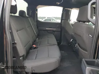 2023 Ford F-150 XL with VIN 1FTEW1C59PFC27499, listed as a Copart auction lot 54453255 with 58,554 mi miles and Salvage title. Bid and sale history available at DreamBid. Image 10.