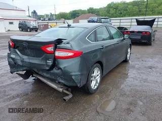 2015 Ford Fusion SE z VIN 1FA6P0HD9F5101925, wystawiony jako IAAI lot #42314400 z przebiegiem 159 548 mil mil oraz . Historia ofert i sprzedaży dostępna na DreamBid. Obrazek 4.
