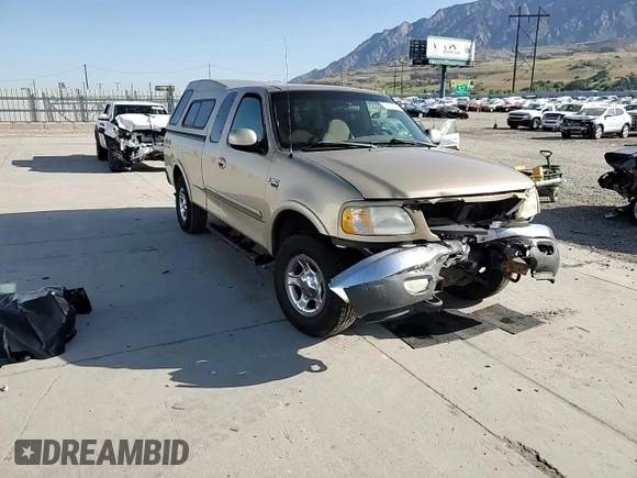 1999 Ford F-150 XL with VIN 1FTRX18L5XKA44484, listed as a Copart auction lot 56232815 with 177,990 mi miles and Salvage title. Bid and sale history available at DreamBid. Image 13.