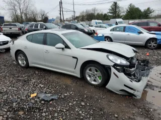 2015 Porsche Panamera 4 z VIN WP0AA2A72FL000789, wystawiony jako Copart lot #51923145 z przebiegiem 138 411 mil mil oraz Szkoda całkowita • Salvage title. Historia ofert i sprzedaży dostępna na DreamBid. Obrazek 4.