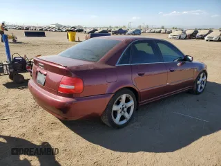 2000 Audi S4 z VIN WAUDD68DXYA127728, wystawiony jako Copart lot #75094394 z przebiegiem 164 612 mil mil oraz Szkody całkowita. Historia ofert i sprzedaży dostępna na DreamBid. Obrazek 3.