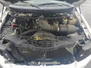 2004 Ford F-150 STX with VIN 1FTRX12W44NA10257, listed as a Copart auction lot 58332115 with 308,653 mi miles and Salvage title. Bid and sale history available at DreamBid. Image 11.
