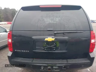 2014 Chevrolet Suburban LT with VIN 1GNSCJE06ER233762, listed as a IAAI auction lot 41515686 with 125,442 mi miles. Bid and sale history available at carsss.com. Image 16.