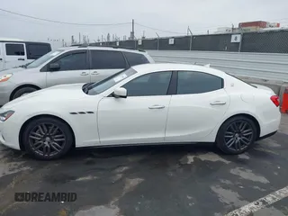 2015 Maserati Ghibli z VIN ZAM57XSA3F1154376, wystawiony jako IAAI lot #42373053 z przebiegiem 81 523 mil mil oraz . Historia ofert i sprzedaży dostępna na DreamBid. Obrazek 14.