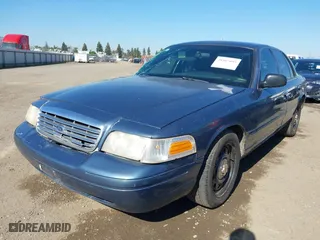 2008 Ford Police Interceptor with VIN 2FAFP71V18X119834, listed as a IAAI auction lot 41867095 with 219,780 mi miles. Bid and sale history available at carsss.com. Image 21.
