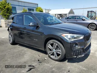 2018 BMW X1 xDrive28i z VIN WBXHT3C33J5L24441, wystawiony jako Copart lot #60468645 z przebiegiem 83 339 mil mil oraz Szkoda całkowita • Salvage title. Historia ofert i sprzedaży dostępna na DreamBid. Obrazek 4.