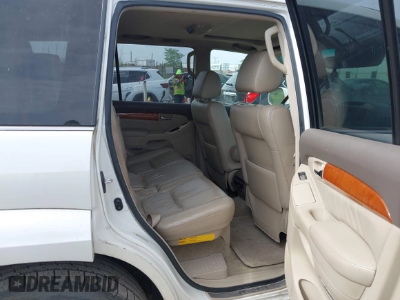 2004 Lexus GX 470 with VIN JTJBT20X440062559, listed as a IAAI auction lot 42142442 with 261,126 mi miles. Bid and sale history available at carsss.com. Image 8.