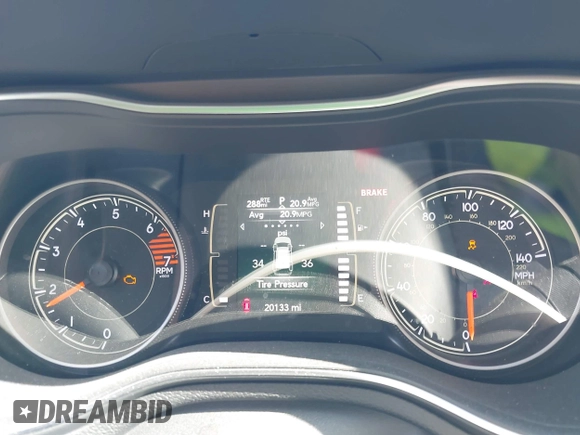 2020 Jeep Cherokee Latitude with VIN 1C4PJLCB4LD648903, listed as a IAAI auction lot 42267209 with 20,133 mi miles and . Bid and sale history available at DreamBid. Image 7.