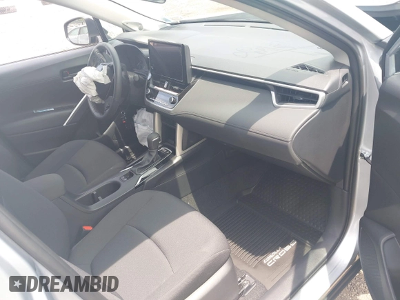 2024 Toyota Corolla Cross LE with VIN 7MUBAABGXRV110138, listed as a IAAI auction lot 42434214 with 8,185 mi miles and . Bid and sale history available at DreamBid. Image 5.