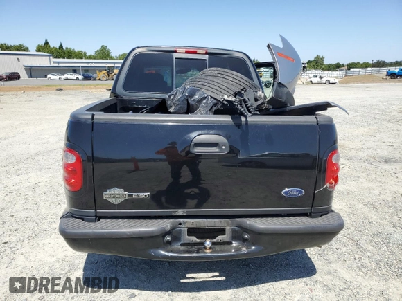 2001 Ford F-150 XLT with VIN 1FTRW07LX1KB47311, listed as a Copart auction lot 58848395 with Not provided miles and Salvage title. Bid and sale history available at DreamBid. Image 6.
