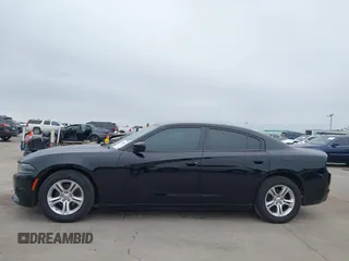 2019 Dodge Charger SXT with VIN 2C3CDXBG2KH579435, listed as a IAAI auction lot 41934441 with 116,983 mi miles and . Bid and sale history available at DreamBid. Image 14.