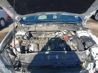 2018 Ford Fusion S with VIN 3FA6P0G77JR229730, listed as a IAAI auction lot 41426559 with 124,568 mi miles. Bid and sale history available at carsss.com. Image 10.