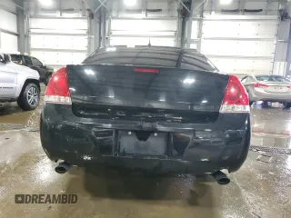 2014 Chevrolet Impala LT with VIN 2G1WB5E3XE1105184, listed as a Copart auction lot 82112844 with 289,783 mi miles and Salvage Title. Bid and sale history available at DreamBid. Image 6.