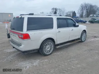 2015 Lincoln Navigator L with VIN 5LMJJ3JT2FEJ03906, listed as a IAAI auction lot 41246837 with 170,298 mi miles. Bid and sale history available at carsss.com. Image 4.