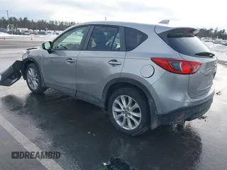 2014 Mazda CX-5 Grand Touring with VIN JM3KE2DY8E0304911, listed as a IAAI auction lot 41672197 with 77,523 mi miles. Bid and sale history available at carsss.com. Image 3.