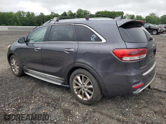 2016 Kia Sorento SX z VIN 5XYPKDA51GG152979, wystawiony jako Copart lot #57942165 z przebiegiem 189 283 mil mil oraz Szkoda całkowita • Salvage title. Historia ofert i sprzedaży dostępna na DreamBid. Obrazek 2.