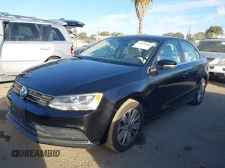 2015 Volkswagen Jetta Sedan 1.8T SE with VIN 3VWD17AJ3FM407697, listed as a IAAI auction lot 40659086 with 107,834 mi miles. Bid and sale history available at carsss.com. Image 17.