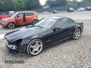 2009 Mercedes-Benz SL 550 with VIN WDBSK71FX9F155436, listed as a Copart auction lot 59389885 with 142,368 mi miles and Salvage title. Bid and sale history available at DreamBid. Image 1.