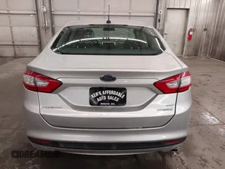 2016 Ford Fusion SE Hybrid z VIN 3FA6P0LU1GR304166, wystawiony jako IAAI lot #41932720 z przebiegiem 68 058 mil mil oraz . Historia ofert i sprzedaży dostępna na DreamBid. Obrazek 17.